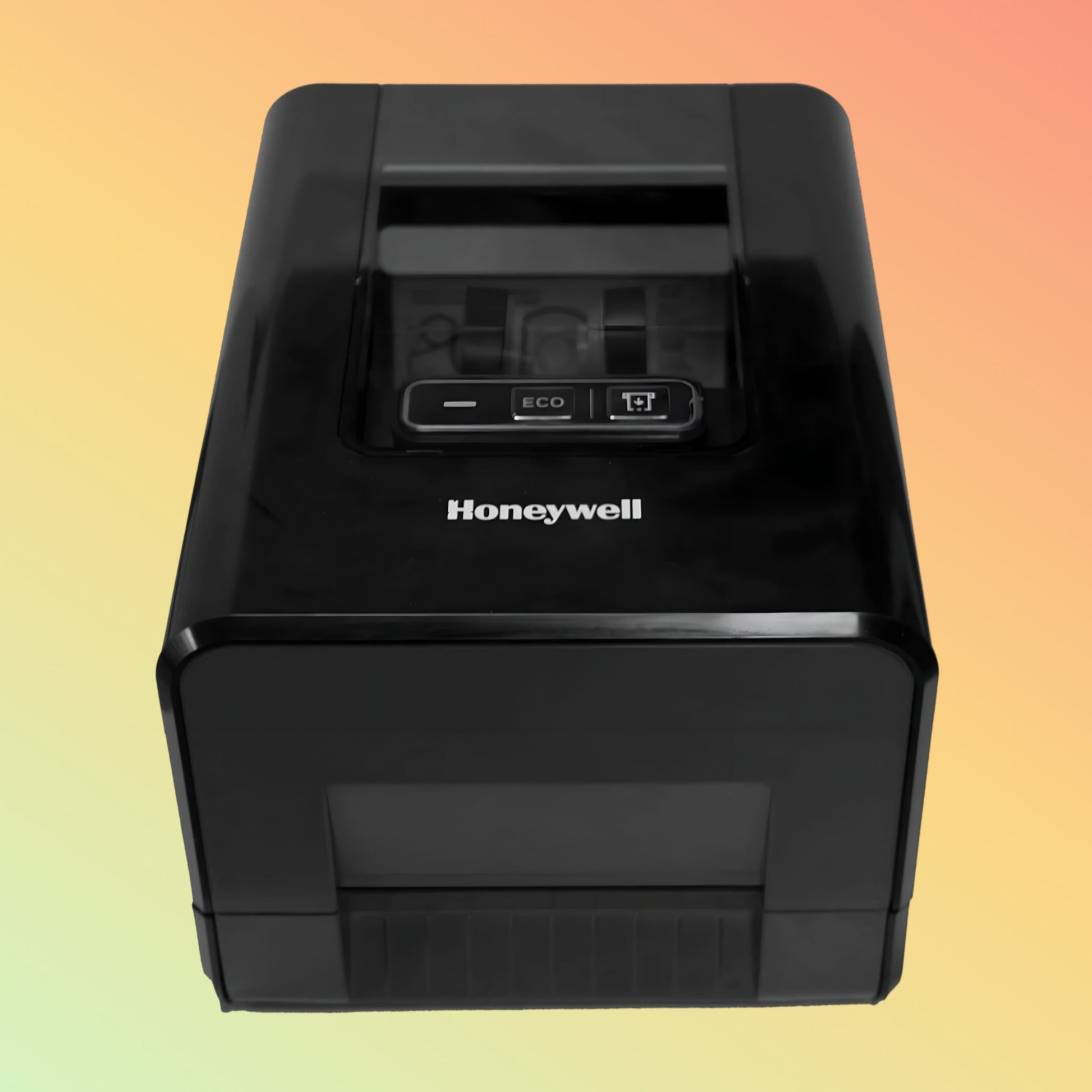 alt="Compact Honeywell PC42E-T thermal transfer barcode printer with easy-to-use interface, ideal for office and retail settings."