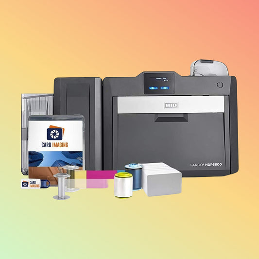 Fargo ID card printer with supplies on a gradient background