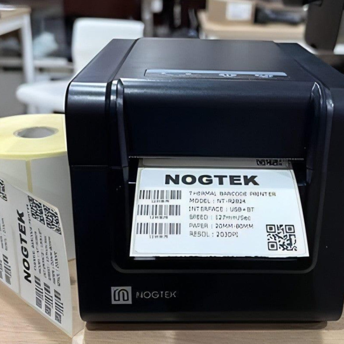 "Nogtek NT-R2824-01 Thermal Label Printer front view showing compact design and multiple connectivity ports."