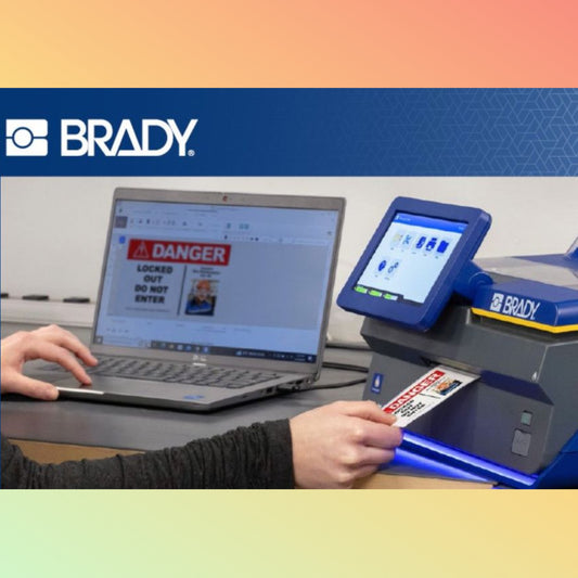 "Close-up of the BRADY J7300 printing vibrant, durable labels for industrial use."