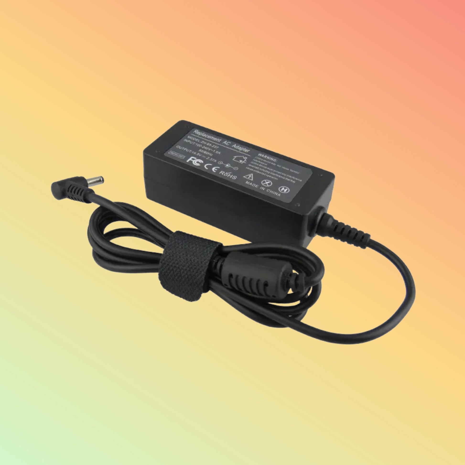 "Compact and Portable Dell 65W Adapter for Laptop Use"