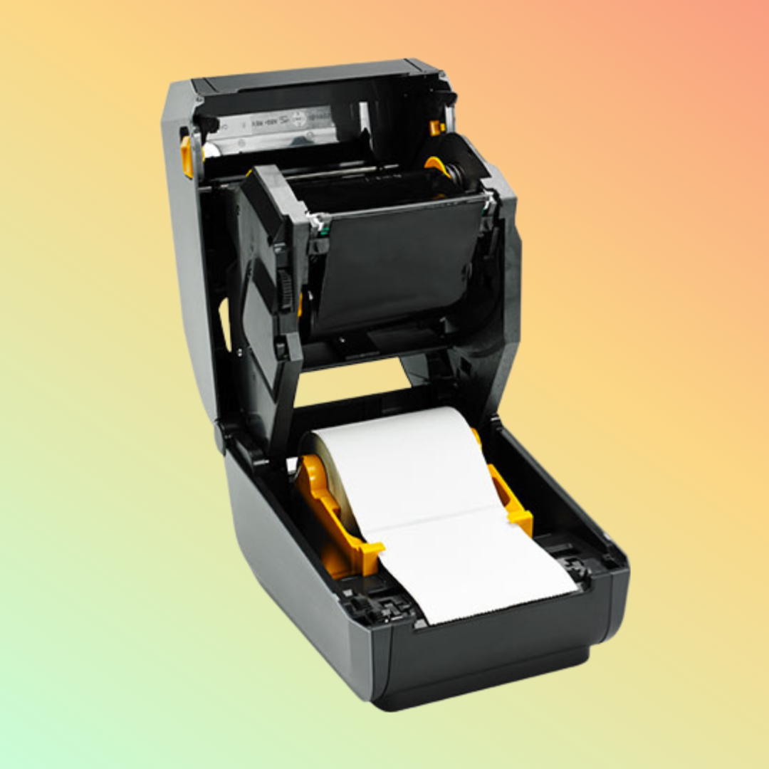 "Zebra GK888T barcode printer with loaded label roll"
