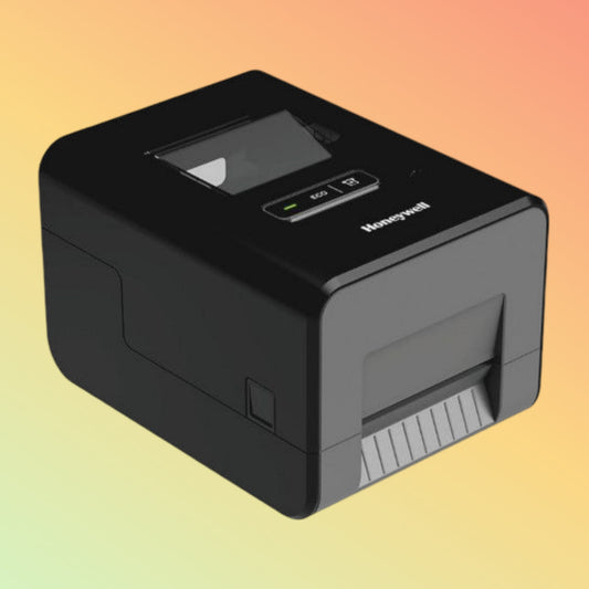 alt="Honeywell PC42E-T desktop thermal transfer barcode printer, designed for compact spaces and efficient label printing in small-scale business environments."