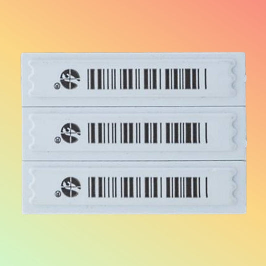 "Sensormatic AM Labels in White color for advanced anti-theft security."